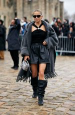 CAROLINE DAUR Arrives at Loewe Fashion Show at Paris Fashion Week 03/01/2024