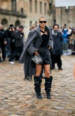 CAROLINE DAUR Arrives at Loewe Fashion Show at Paris Fashion Week 03/01/2024