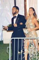 CHRISSY TEIGEN Leaves Vanity Fair Oscar Party in Beverly Hills 03/10/2024