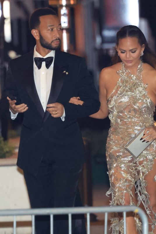 CHRISSY TEIGEN Leaves Vanity Fair Oscar Party in Beverly Hills 03/10/2024