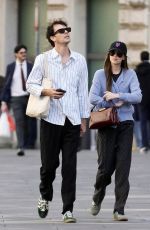 DAKOTA JOHNSON and Chris Martin Out in Rome 03/21/2024