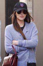 DAKOTA JOHNSON and Chris Martin Out in Rome 03/21/2024