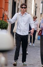 DAKOTA JOHNSON and Chris Martin Out in Rome 03/21/2024