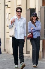 DAKOTA JOHNSON and Chris Martin Out in Rome 03/21/2024