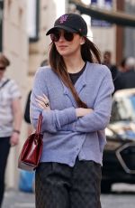 DAKOTA JOHNSON and Chris Martin Out in Rome 03/21/2024