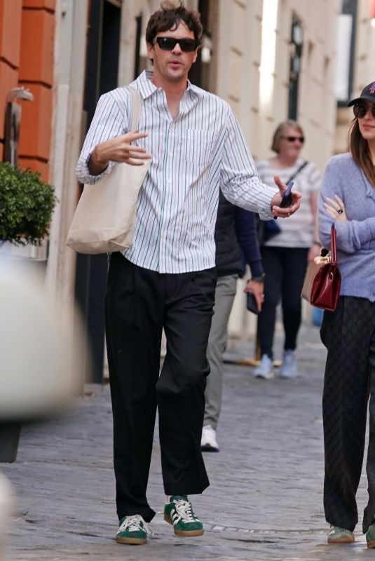 DAKOTA JOHNSON and Chris Martin Out in Rome 03/21/2024