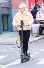 DEBORRA-LEE FUENTES Riding an Electric Scooter Out in New York 03/25/2024