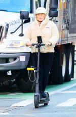 DEBORRA-LEE FUENTES Riding an Electric Scooter Out in New York 03/25/2024