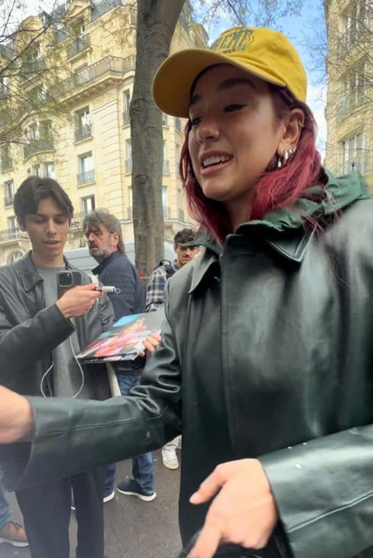 DUA LIPA Signed Autographs for Fans Out in Paris 03/24/2024