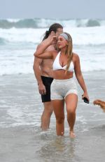 EDEN HARPER Out with Her Boyfiend and Their Dog on Gold Coast Beach 03/23/2024