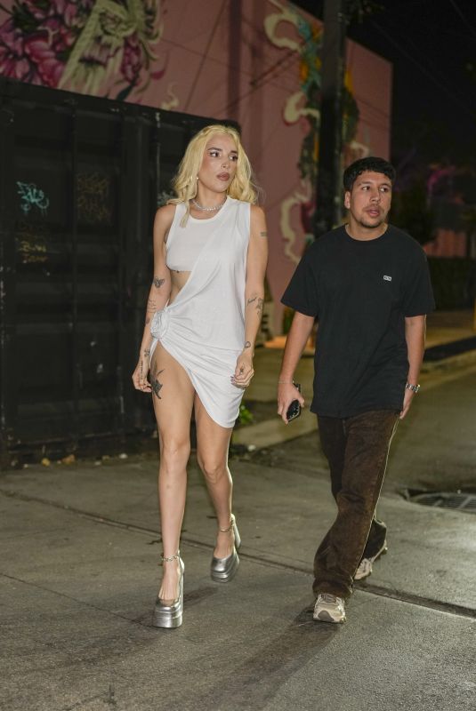 ELENA ROSE Arrives at Anitta
