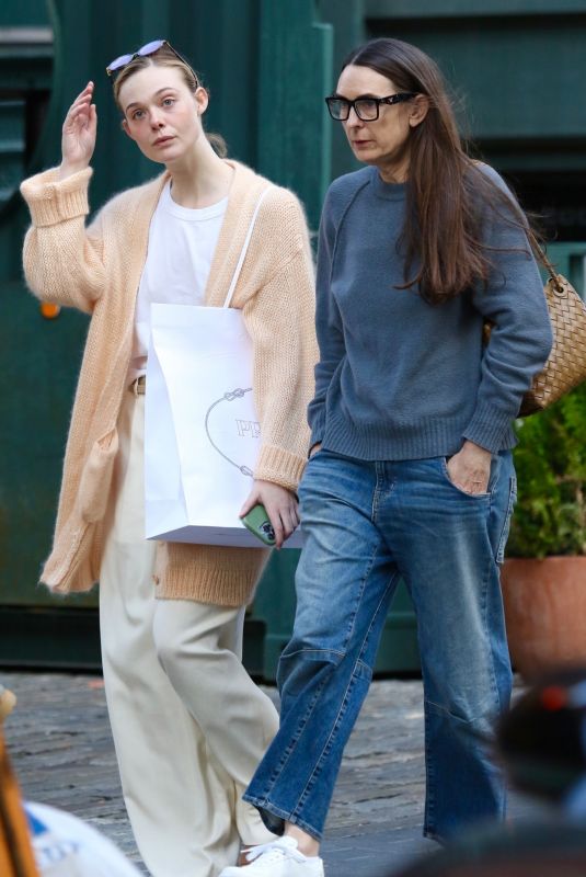 ELLE FANNING Out Shopping with Her Mom in New York 03/18/2024