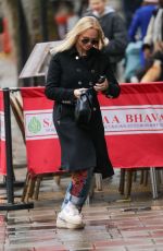 EMMA BUNTON Out and About in London 02/28/2024