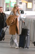 GISELE BUNDCHEN Arrives at JFK AIrport in New York 03/20/2024
