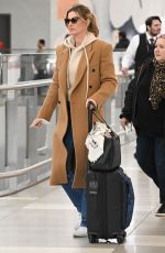 GISELE BUNDCHEN Catches a Flight Out of New York 03/22/2024