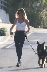 GISELE BUNDCHEN Out for a Dog Walk in Miami 03/16/2024