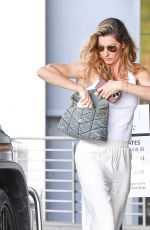 GISELE BUNDCHEN Out for Lunch with a Friend in Miami 03/14/2024
