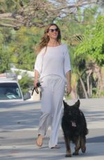 GISELE BUNDCHEN Out with Her Dog in Miami Beach 03/17/2024
