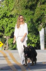 GISELE BUNDCHEN Out with Her Dog in Miami Beach 03/17/2024