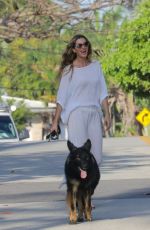 GISELE BUNDCHEN Out with Her Dog in Miami Beach 03/17/2024