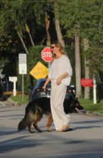 GISELE BUNDCHEN Out with Her Dog in Miami Beach 03/17/2024