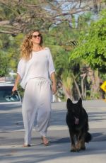 GISELE BUNDCHEN Out with Her Dog in Miami Beach 03/17/2024