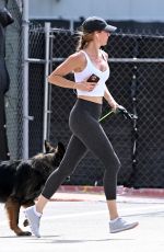 GISELE BUNDCHEN Out with Her German Shepherd at Beach Path in Surfside 03/03/2024