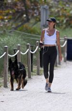 GISELE BUNDCHEN Out with Her German Shepherd at Beach Path in Surfside 03/03/2024