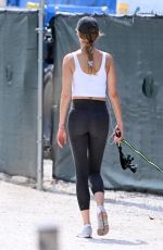 GISELE BUNDCHEN Out with Her German Shepherd at Beach Path in Surfside 03/03/2024