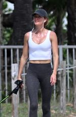 GISELE BUNDCHEN Out with Her German Shepherd at Beach Path in Surfside 03/03/2024