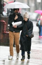 JULIANNE MOORE and Bart Freundlich Out on Rainy Day in New York 03/06/2024