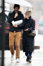 JULIANNE MOORE and Bart Freundlich Out on Rainy Day in New York 03/06/2024