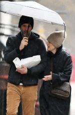 JULIANNE MOORE and Bart Freundlich Out on Rainy Day in New York 03/06/2024