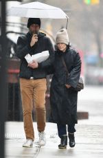 JULIANNE MOORE and Bart Freundlich Out on Rainy Day in New York 03/06/2024