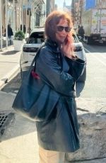 KATIE HOLMES Takes a Call Out in New York 03/01/2024