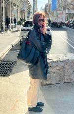 KATIE HOLMES Takes a Call Out in New York 03/01/2024
