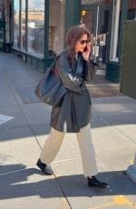 KATIE HOLMES Takes a Call Out in New York 03/01/2024