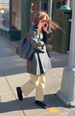 KATIE HOLMES Takes a Call Out in New York 03/01/2024