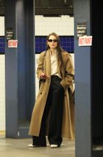 KATIE HOLMES Waiting for a Uptown Train in New York 03/24/2024