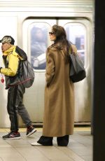 KATIE HOLMES Waiting for a Uptown Train in New York 03/24/2024