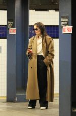 KATIE HOLMES Waiting for a Uptown Train in New York 03/24/2024