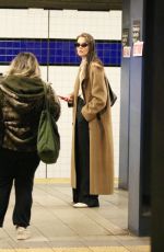 KATIE HOLMES Waiting for a Uptown Train in New York 03/24/2024