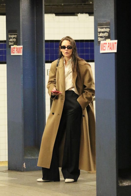 KATIE HOLMES Waiting for a Uptown Train in New York 03/24/2024