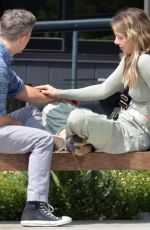 KELLY RIZZO and Breckin Meyer Hugging and Kissing Outside a Coffee Shop in Los Angeles 03/22/2024