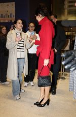 KENDALL JENNER Is Given an Eiffel Tower Keychain Souvenier from a Fan in Paris 03/08/2024