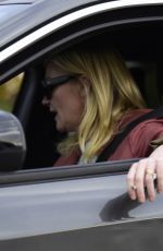 KIRSTEN DUNST Out Smoking in Her Car in Los Angeles 02/27/2024