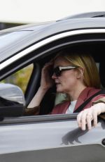 KIRSTEN DUNST Out Smoking in Her Car in Los Angeles 02/27/2024