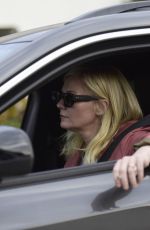 KIRSTEN DUNST Out Smoking in Her Car in Los Angeles 02/27/2024