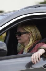 KIRSTEN DUNST Out Smoking in Her Car in Los Angeles 02/27/2024
