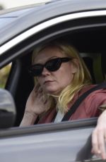 KIRSTEN DUNST Out Smoking in Her Car in Los Angeles 02/27/2024